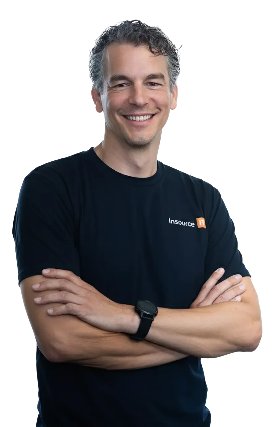 Hassan, Director of Insource IT, smiling with arms crossed