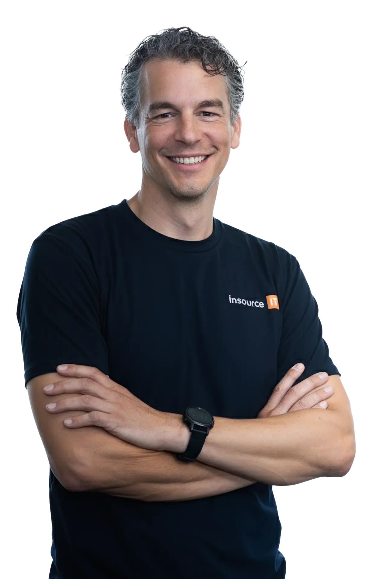 Hassan, Director of Insource IT, smiling with arms crossed